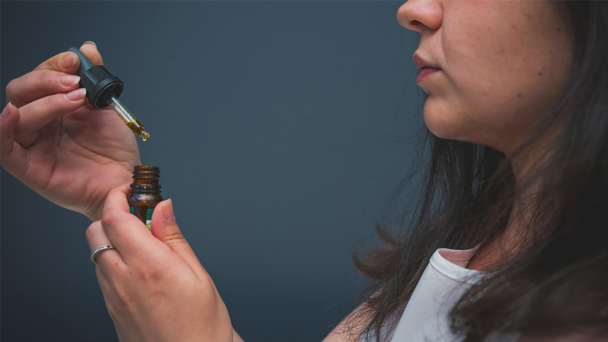 Woman and CBD oil